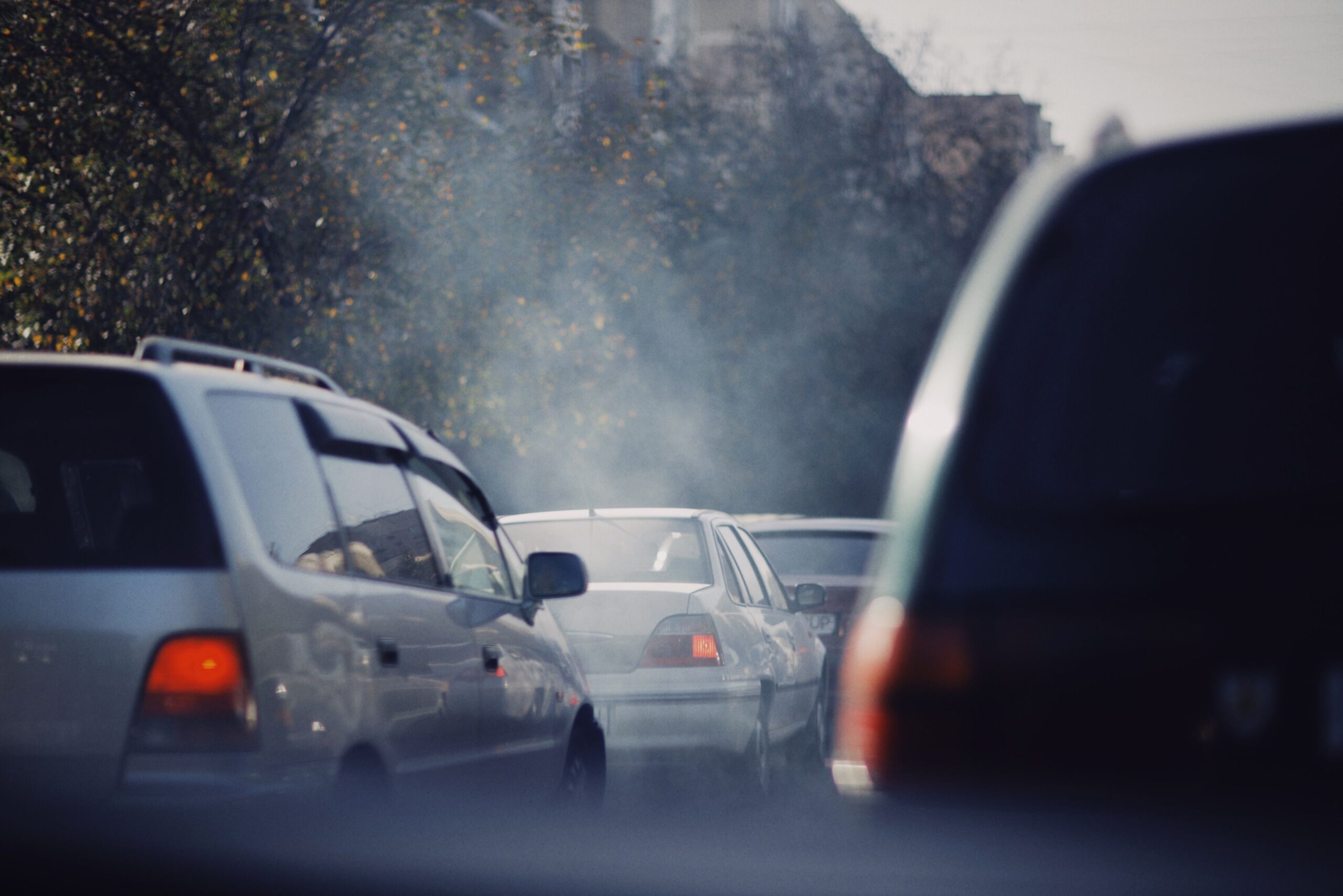 Busy city street with traffic and air pollution
