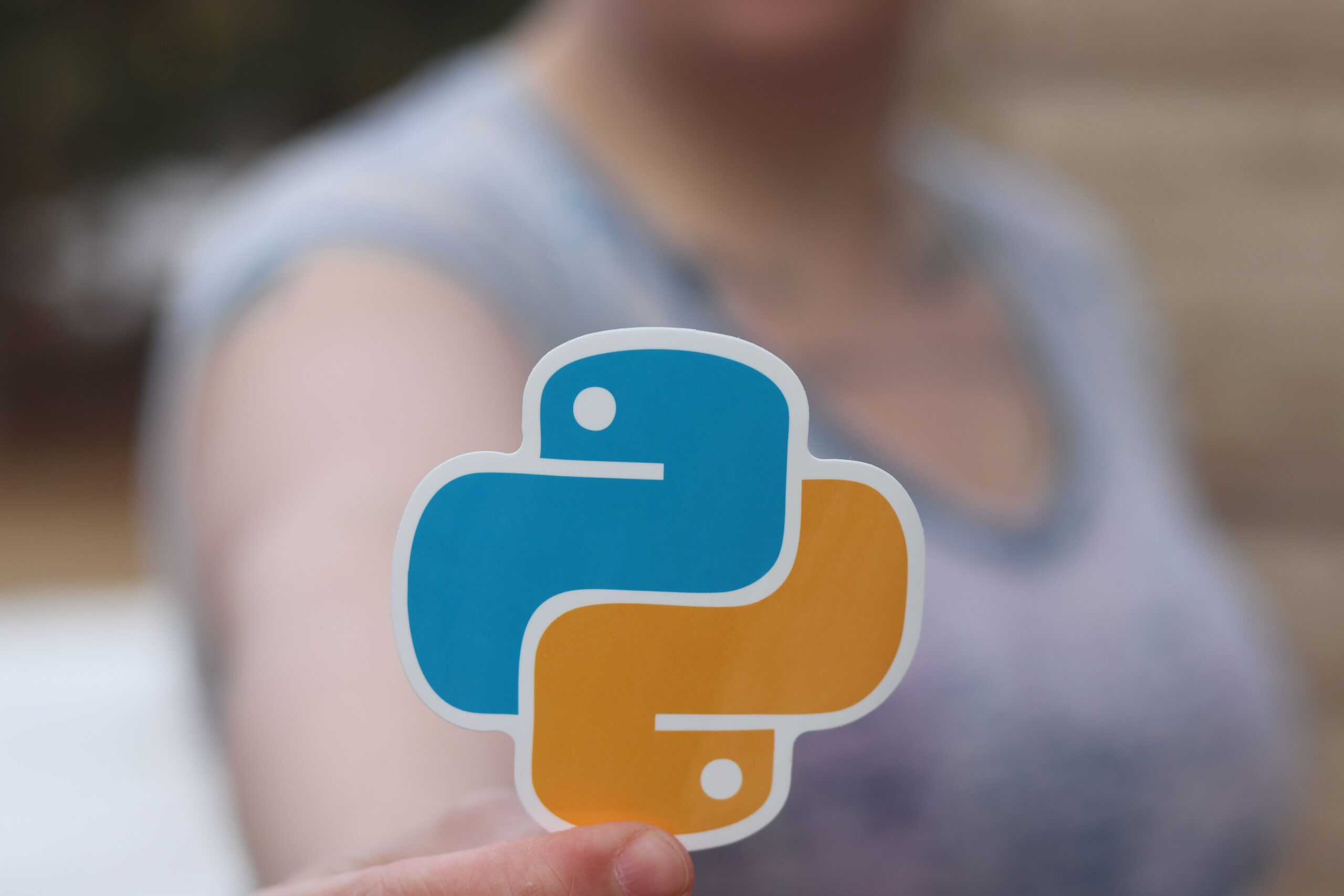 Person speaking with language and code symbols comparison