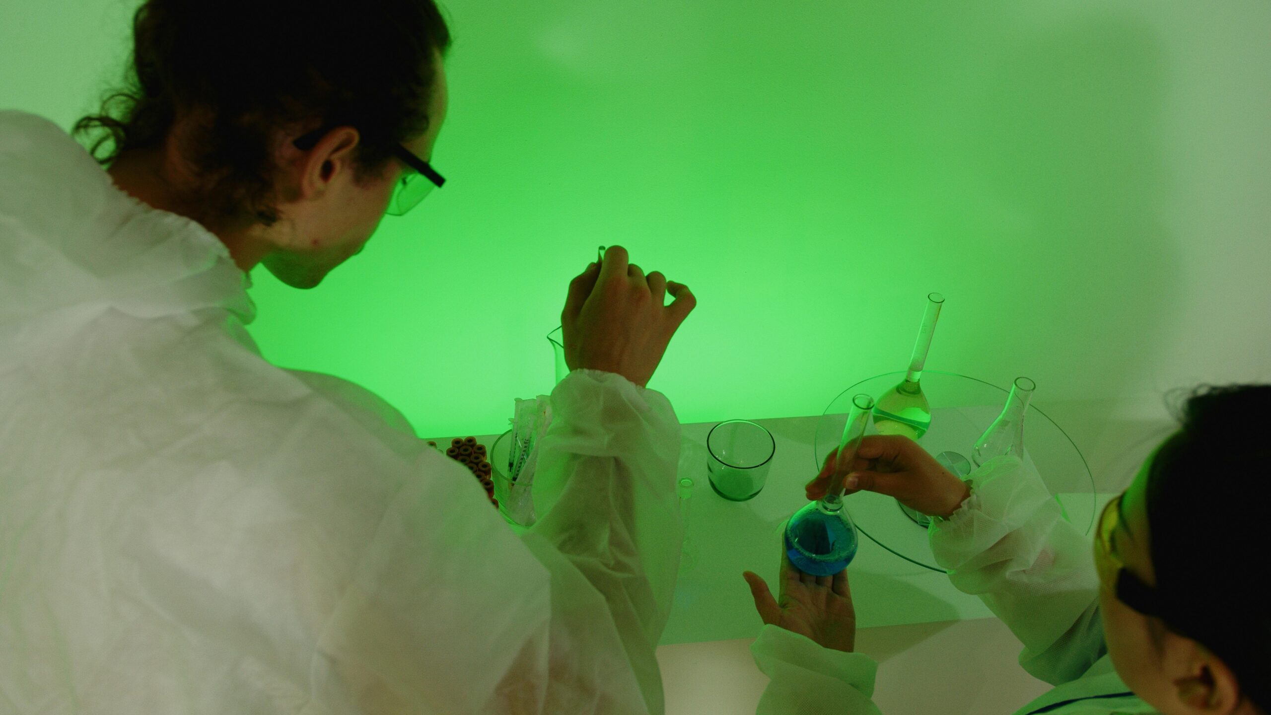 Scientist applying transcranial electrical stimulation research participant during